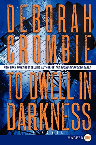 To dwell in darkness : a novel